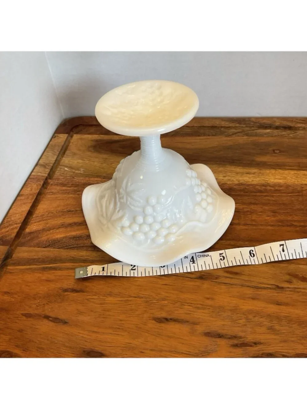 White milk Glass Wavy Footed Bowl With Grape Leaf embossed Pattern